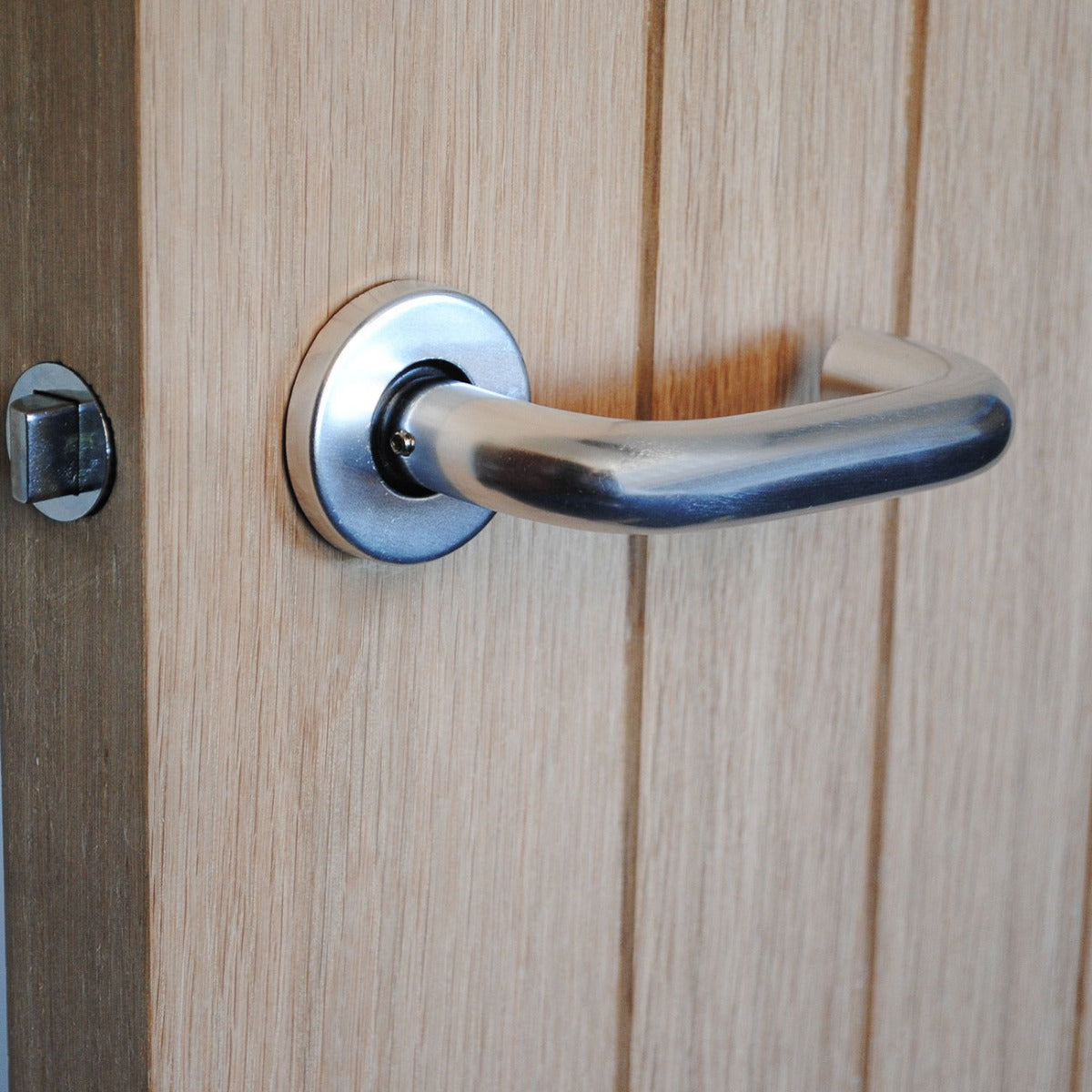 ViBE Round Bar Lever on Rose in Polished Anodised Aluminium for Internal Doors