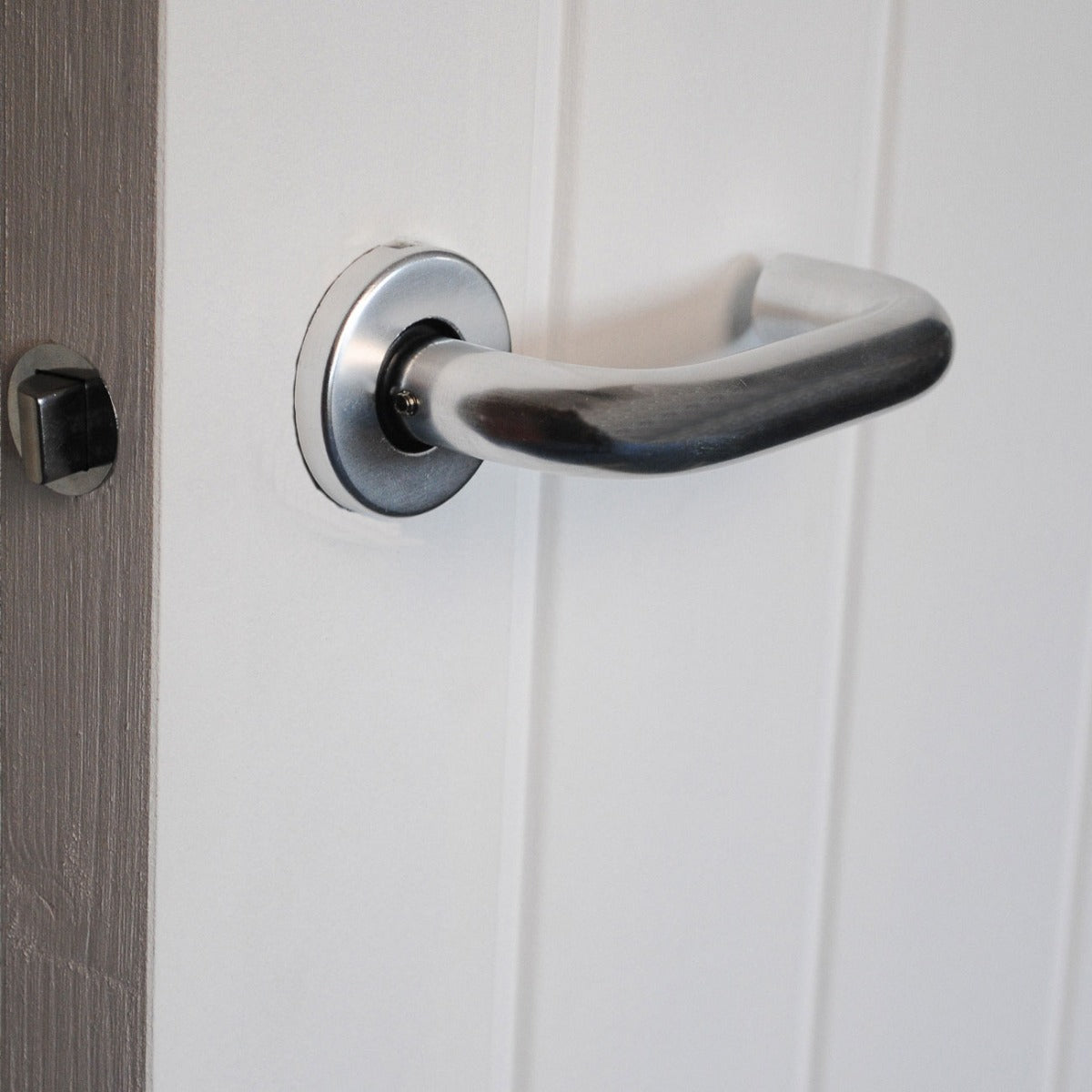 ViBE Round Bar Lever on Rose in Polished Anodised Aluminium for Internal Doors