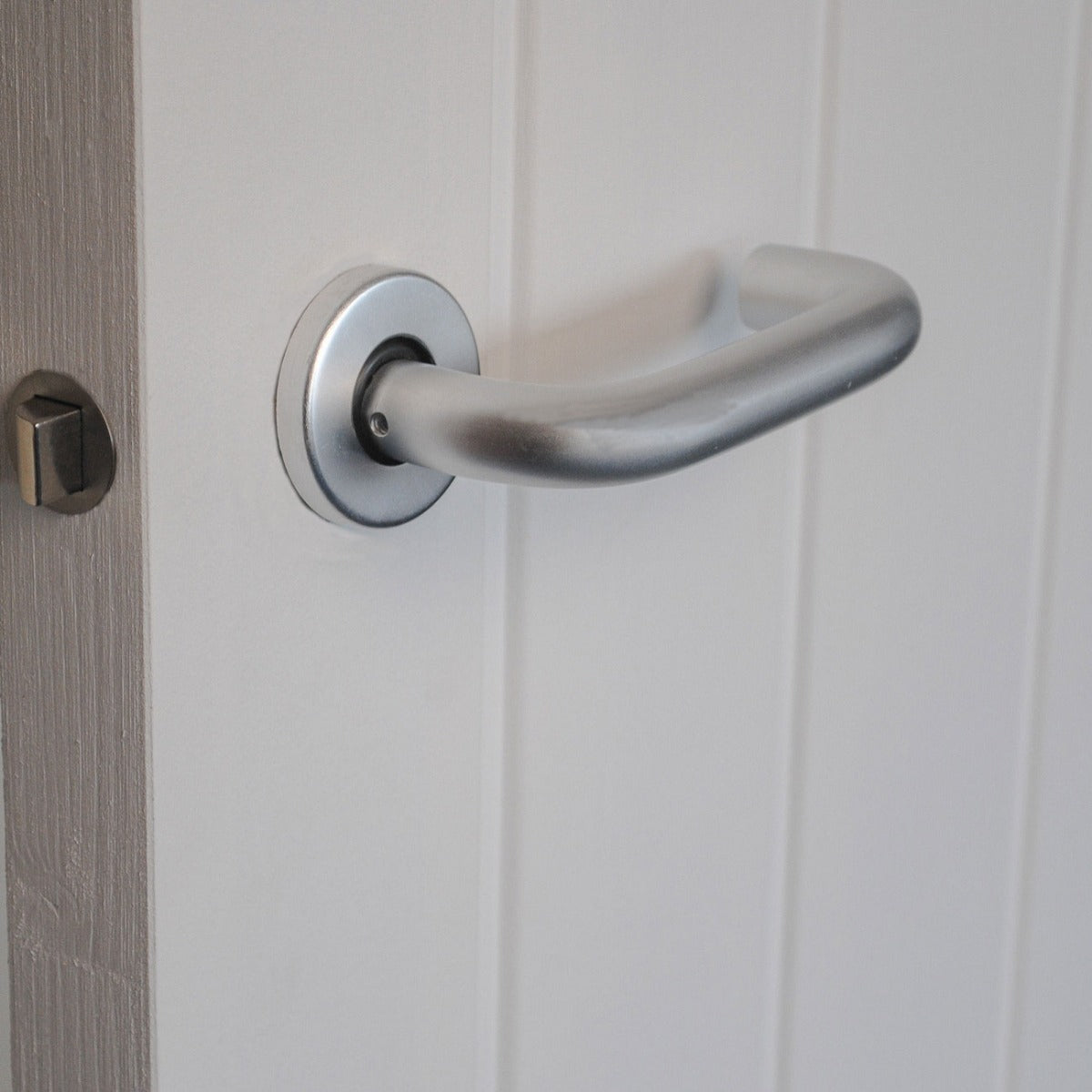 ViBE Round Bar Lever on Rose Door Handle in Satin Anodised Aluminium for Internal Doors