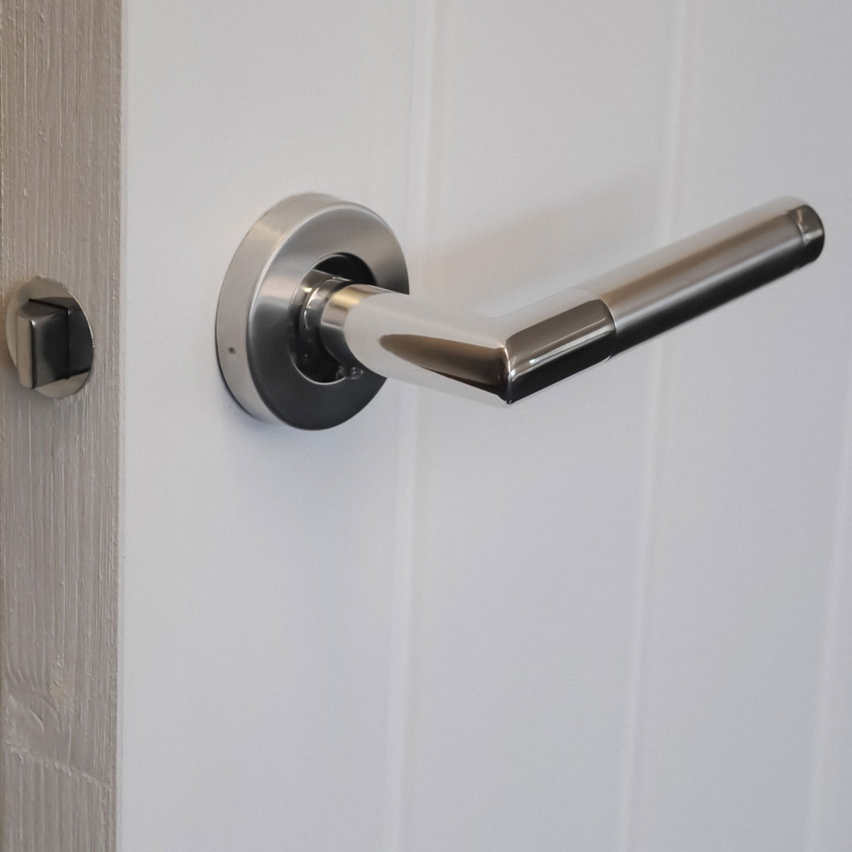 ViBE Dubel Lever on Rose Door Handle in a Dual Satin & Polished Stainless Steel Finish for Internal Doors