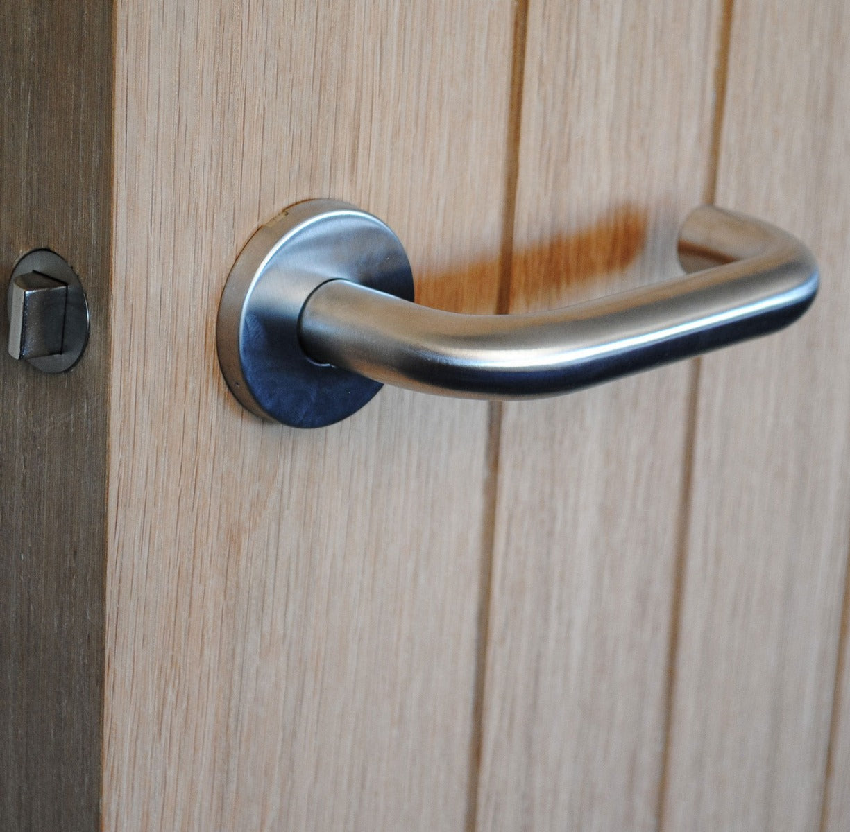 ViBE Runda Lever on Rose Door Handle in Satin Stainless Steel for Internal Doors