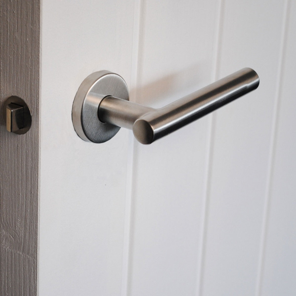 ViBE Horna Lever on Rose Door Handle in Satin Stainless Steel for Internal Doors