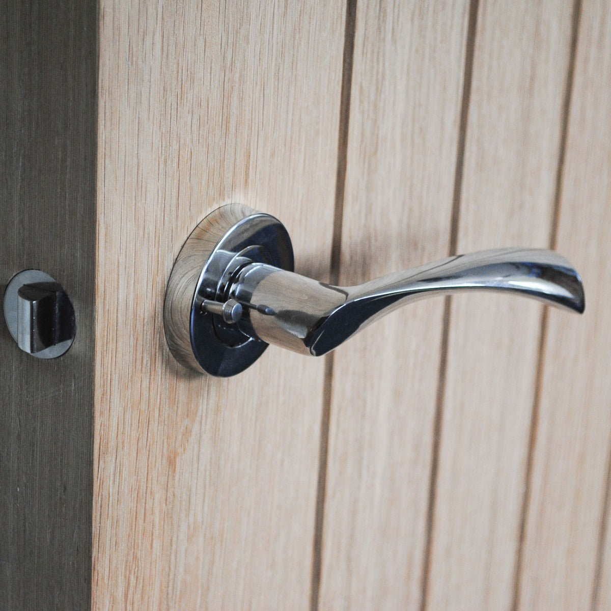 VIBE Design Push Button Privacy Twirl Lever in Polished Chrome for Bathroom Doors