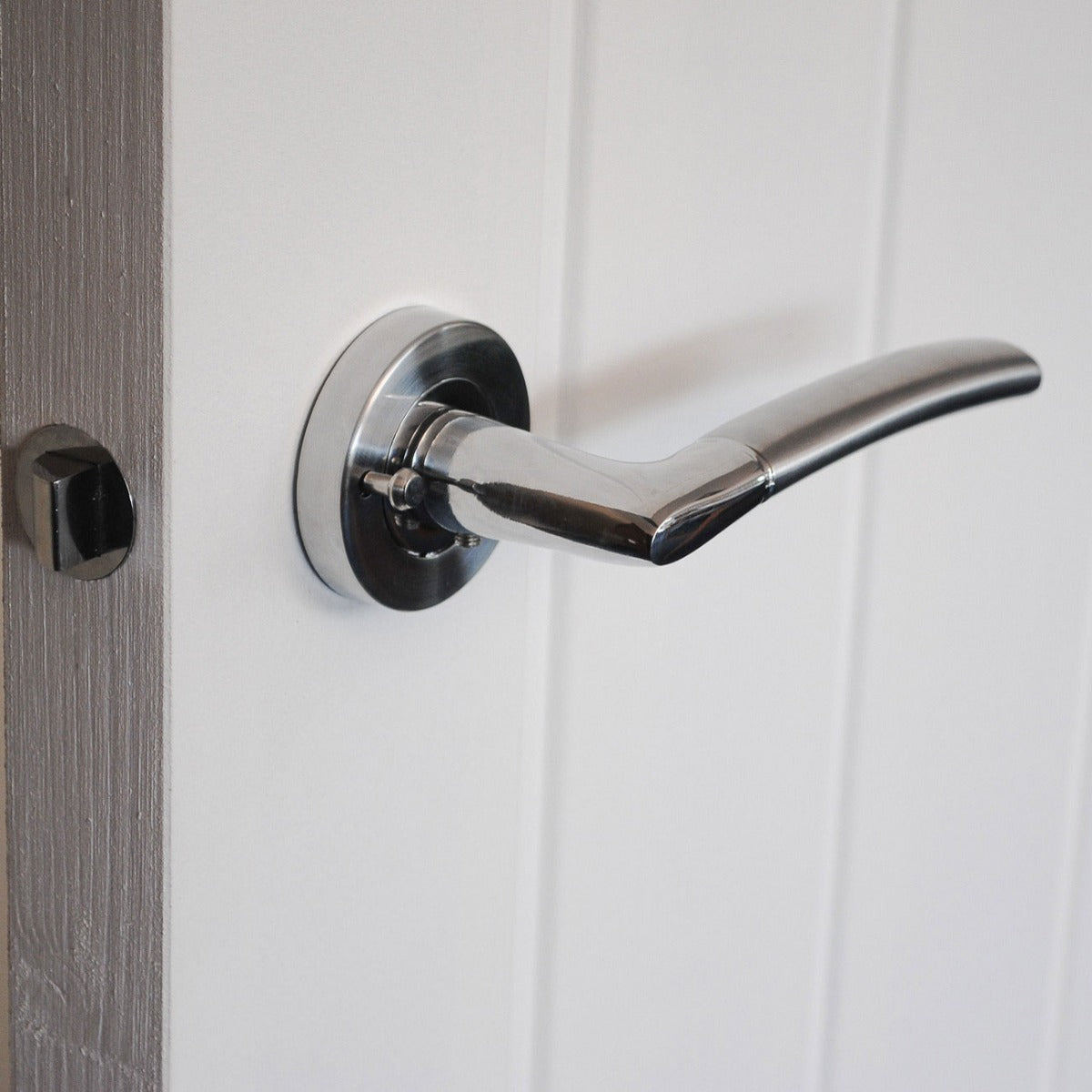 VIBE Design Push Button Privacy IOS Lever in Satin/Polished Chrome for Bathroom Doors