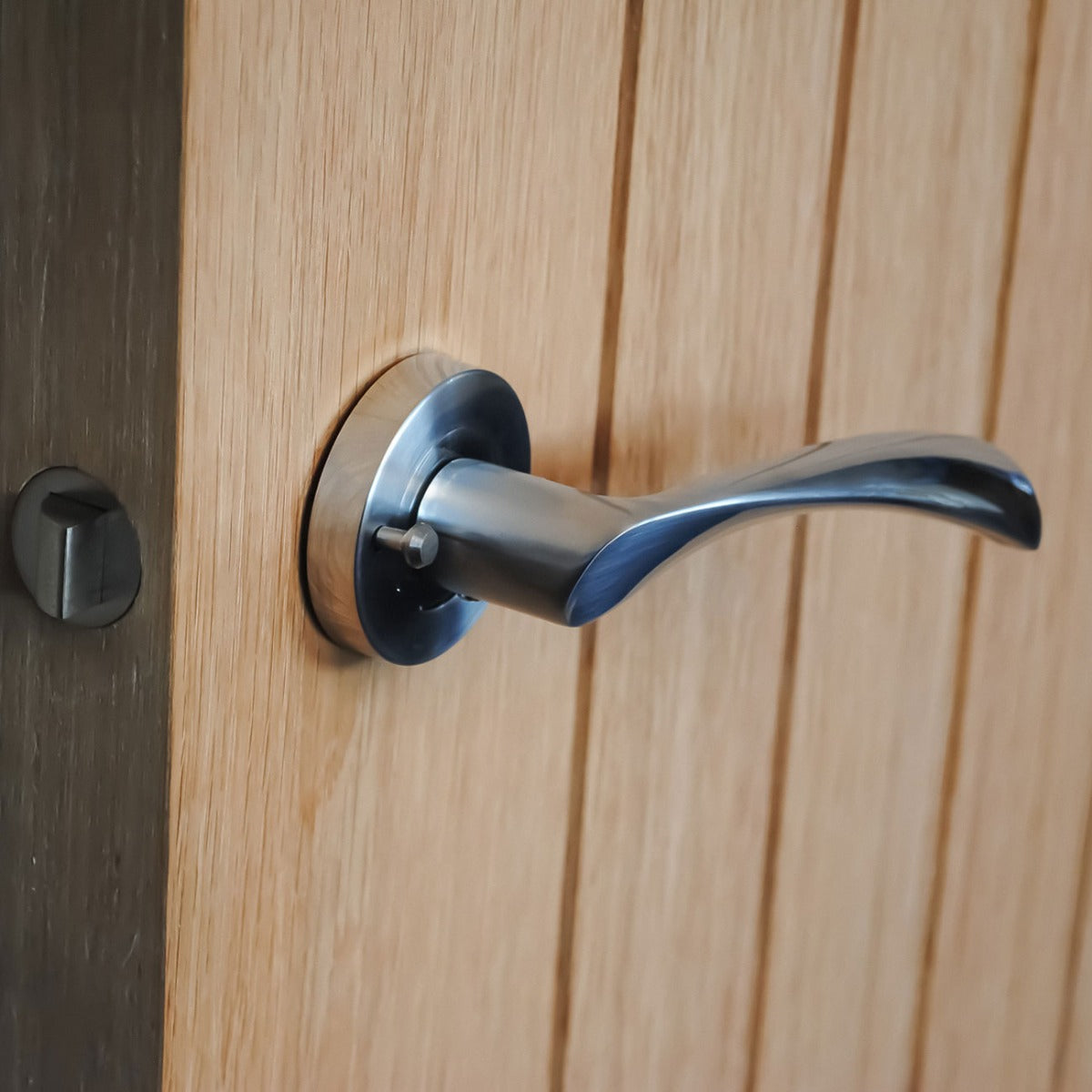 VIBE Design Push Button Privacy Twirl Lever in Satin Chrome for Bathroom Doors