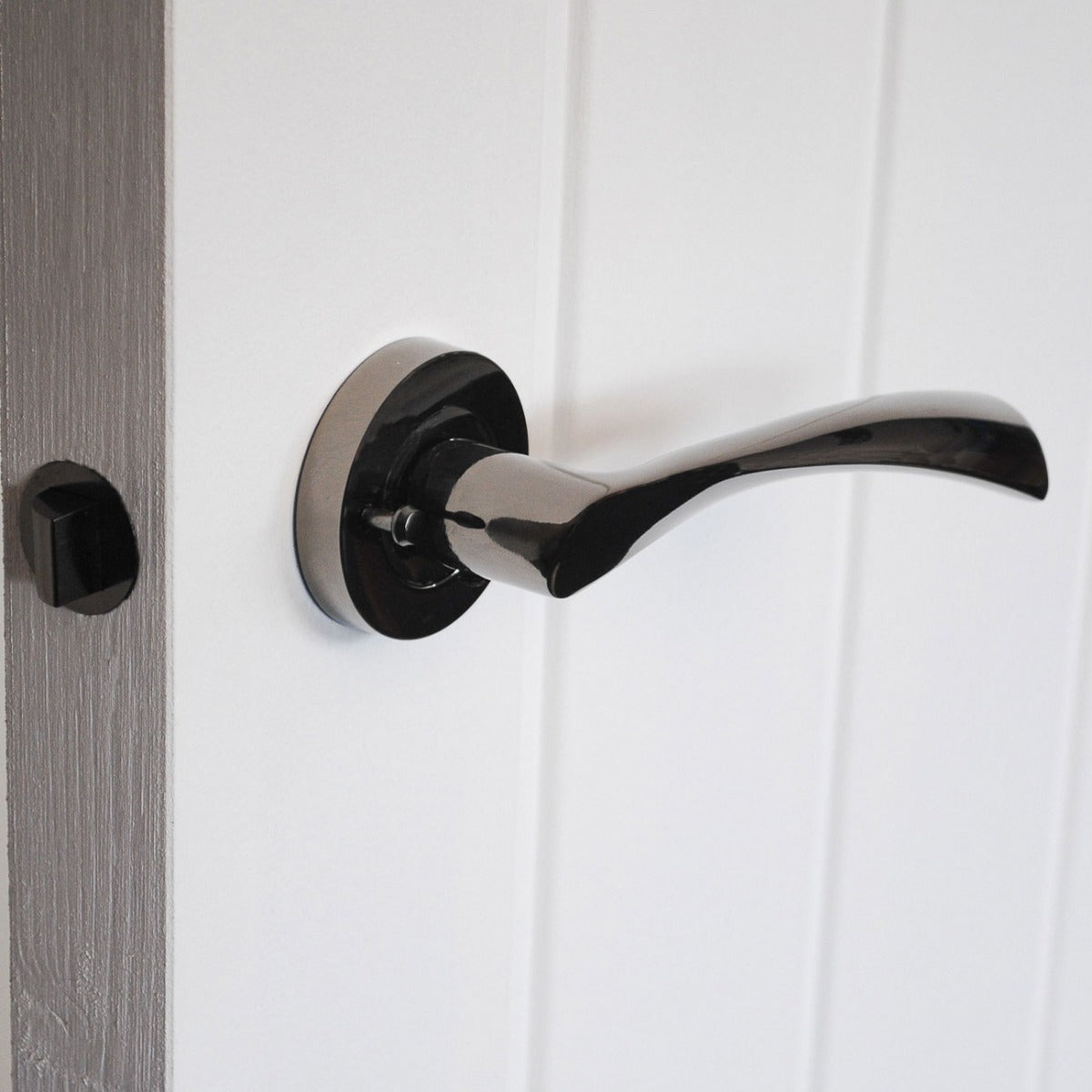 ONYX Design Push Button Privacy Twirl Lever in Polished Black Nickel for Bathroom Doors